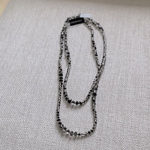 Long beaded necklace.